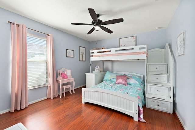 bedroom featuring dark wood-type flooring and ceiling fan