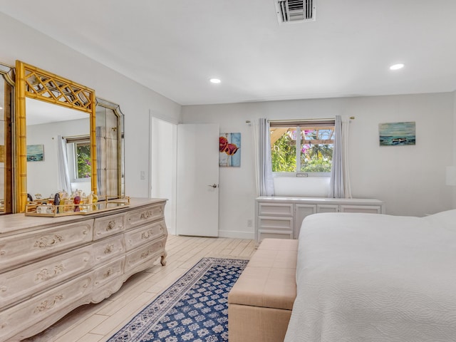 bedroom featuring light hardwood / wood-style floors