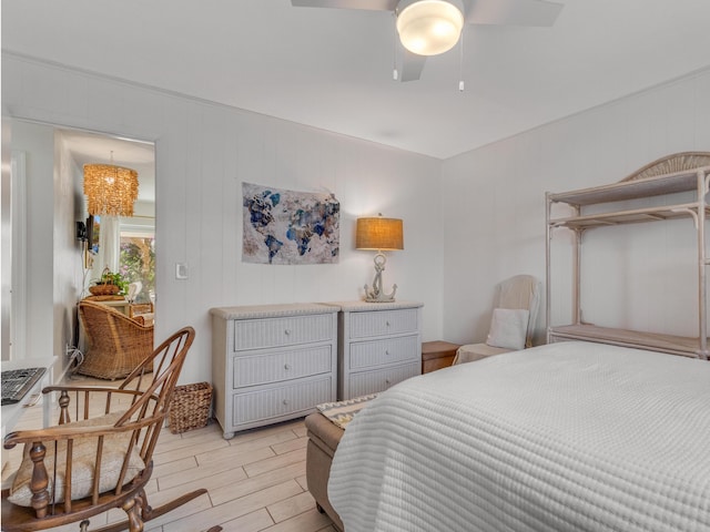 bedroom featuring ceiling fan and light wood-type flooring