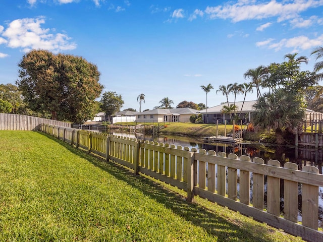 view of yard with a water view