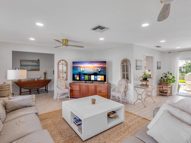 living room with ceiling fan