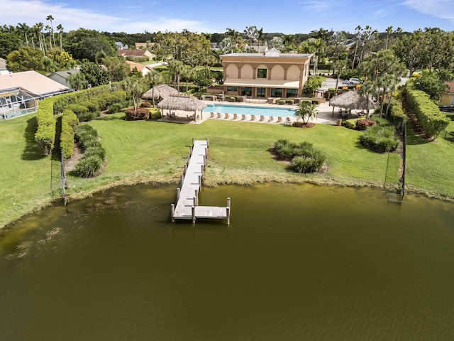 birds eye view of property with a water view