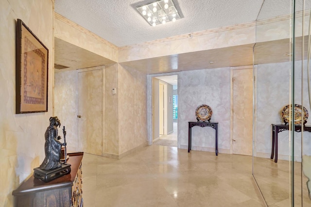 corridor featuring a textured ceiling