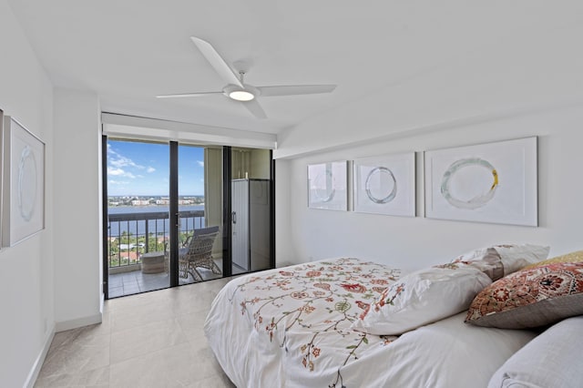 1900 Consulate Pl Unit 1902, West Palm Beach, FL 33401 - tiled bedroom featuring a water view, ceiling fan, floor to ceiling windows, and access to outside