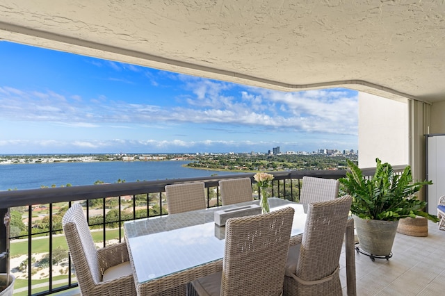 balcony featuring a water view