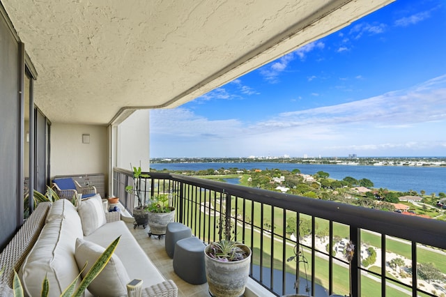 1900 Consulate Pl Unit 1902, West Palm Beach, FL 33401 - balcony featuring a water view and an outdoor hangout area