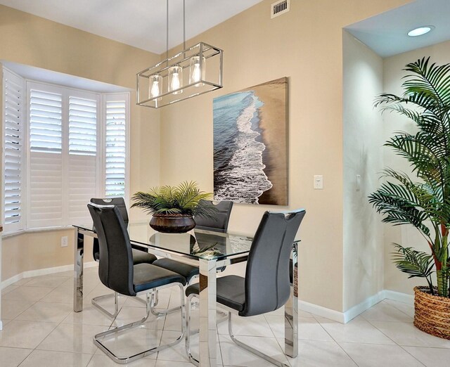 dining room with light tile patterned floors