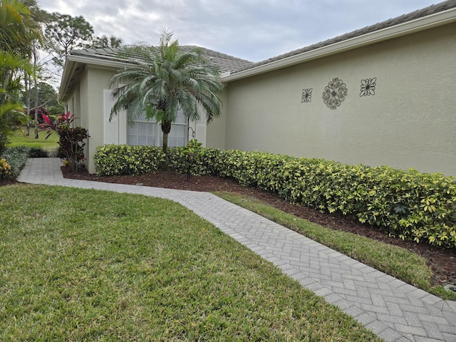 exterior space with a lawn