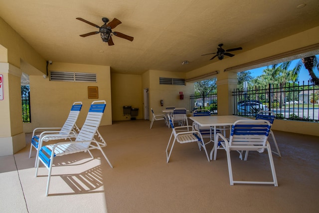 view of patio / terrace featuring ceiling fan