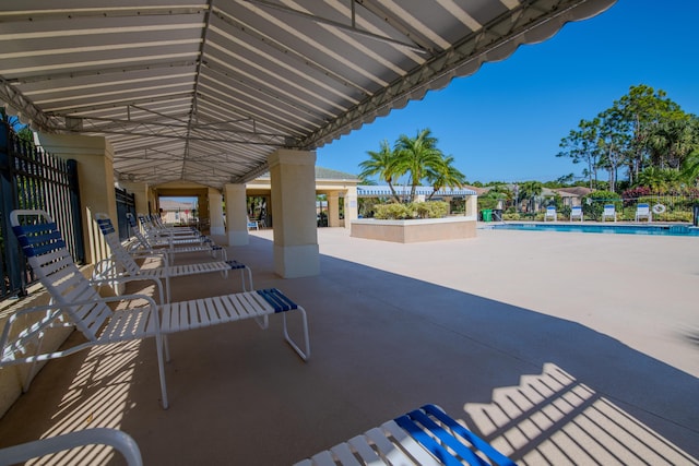 view of patio with a community pool