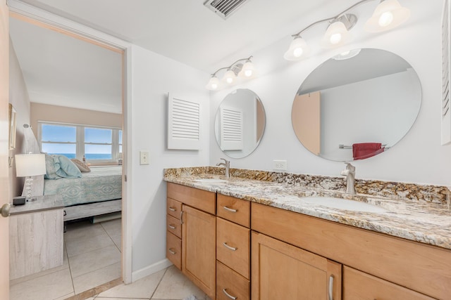 bathroom featuring vanity and tile patterned floors