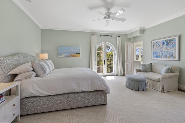 carpeted bedroom with access to exterior, crown molding, french doors, and ceiling fan