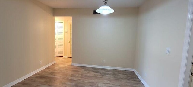 unfurnished dining area with hardwood / wood-style floors