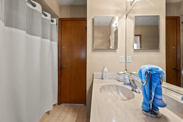 bathroom with vanity and tile patterned floors