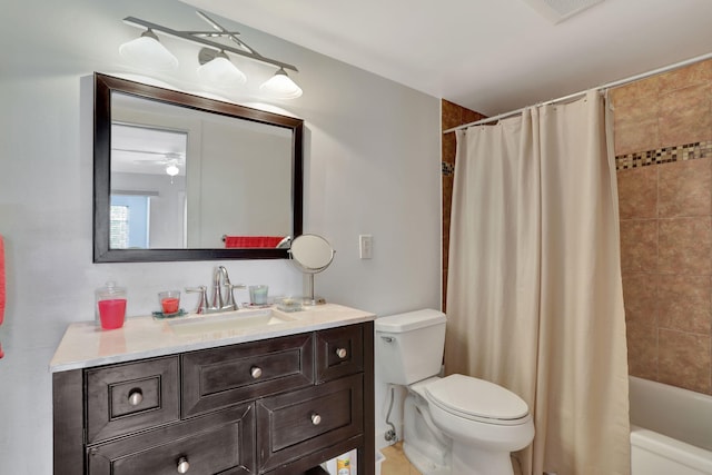 full bathroom featuring toilet, ceiling fan, shower / bath combination with curtain, and vanity