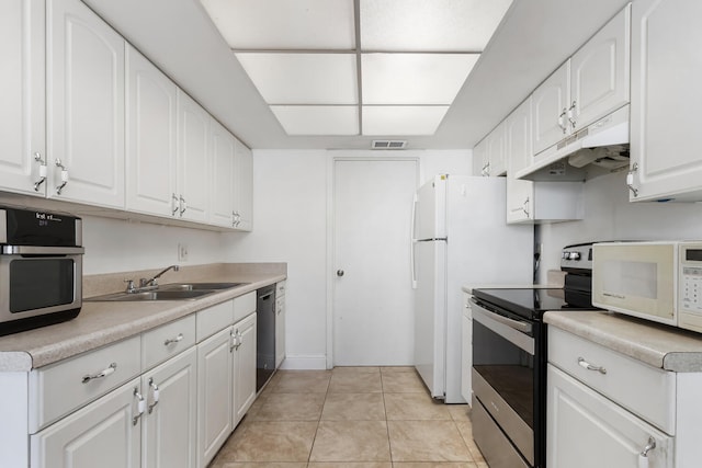 kitchen featuring sink, light tile patterned floors, electric range, dishwasher, and white cabinets