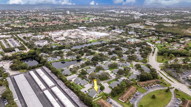 bird's eye view with a water view