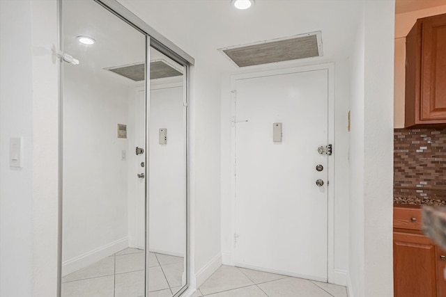 interior space featuring light tile patterned flooring