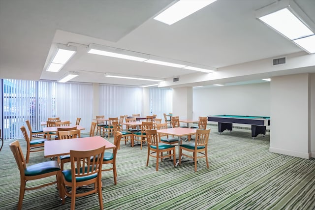 dining space featuring pool table, expansive windows, and carpet flooring