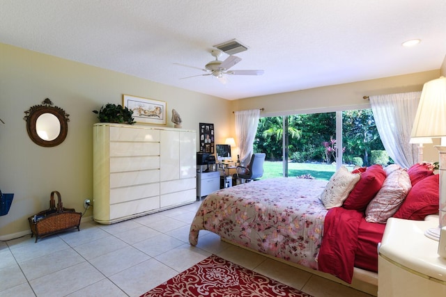 bedroom featuring light tile patterned floors, a textured ceiling, ceiling fan, and access to outside