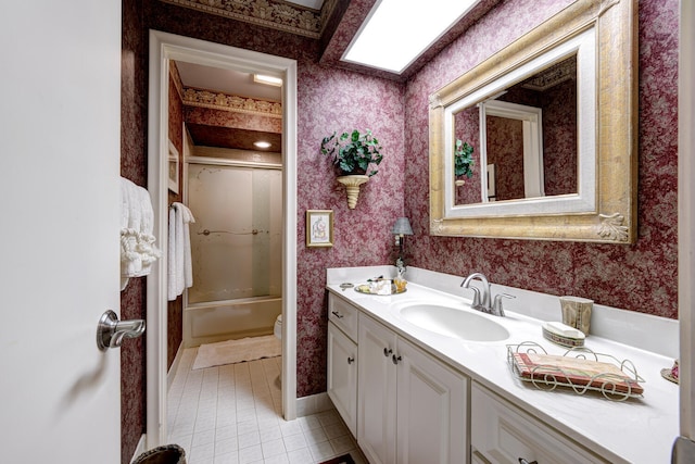 full bathroom with toilet, vanity, tile patterned floors, and shower / tub combination