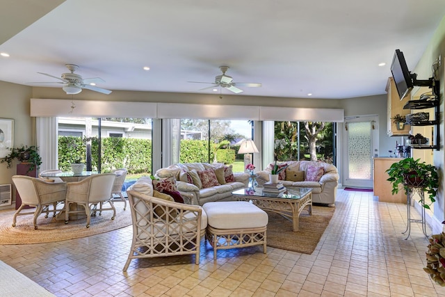 tiled living room featuring ceiling fan