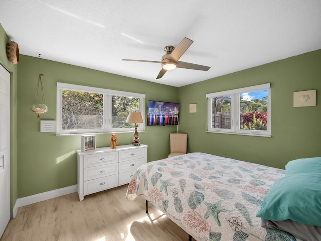 bedroom featuring ceiling fan and light hardwood / wood-style floors