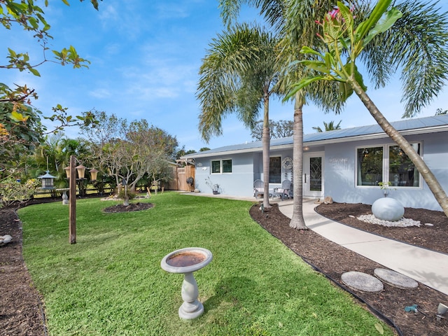 view of front of property with a front lawn