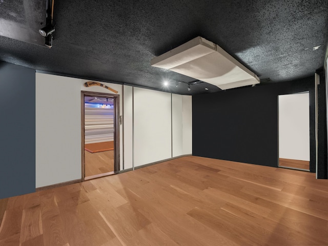 interior space with hardwood / wood-style floors