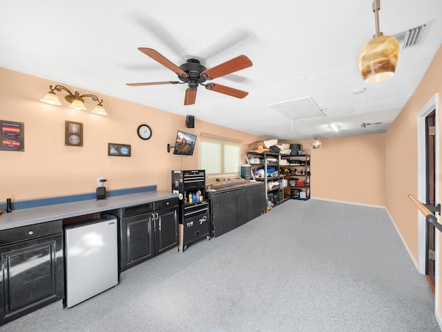 bar featuring ceiling fan, pendant lighting, light colored carpet, and fridge