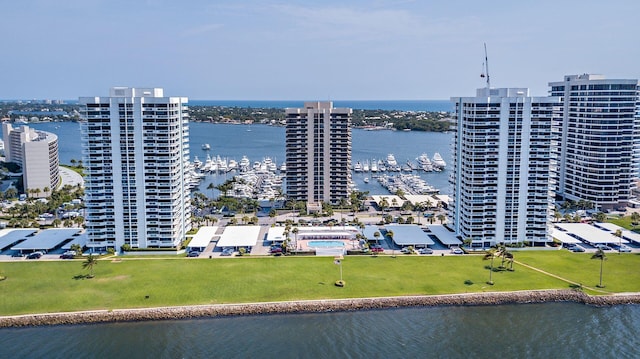 birds eye view of property with a water view