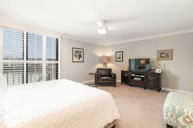 bedroom featuring crown molding, light colored carpet, a textured ceiling, and ceiling fan