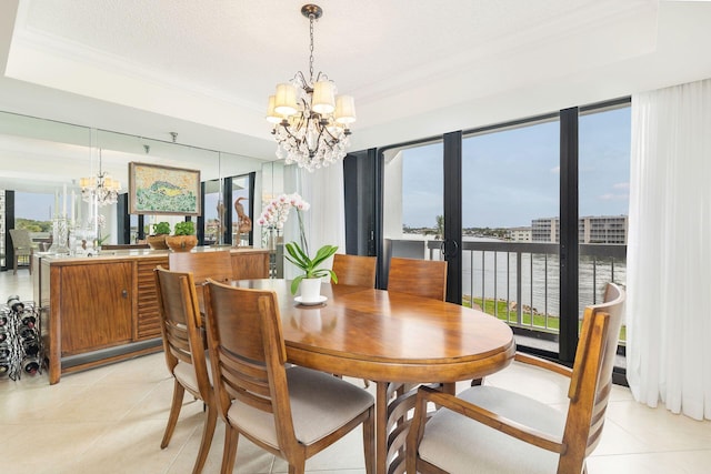 dining room with a healthy amount of sunlight and a notable chandelier