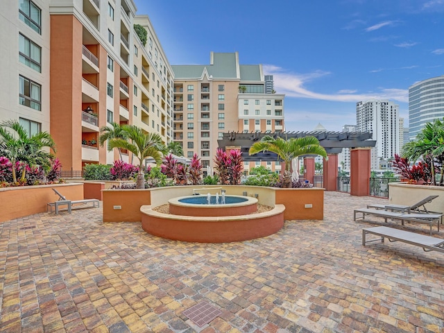 view of home's community featuring a pergola