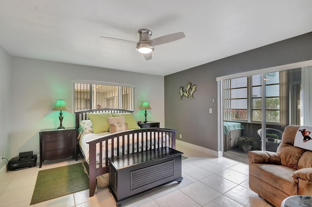 bedroom with ceiling fan and light tile patterned floors