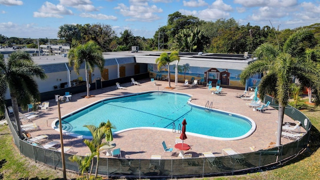 view of swimming pool with a patio