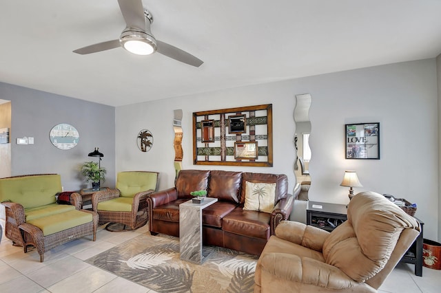 tiled living room featuring ceiling fan