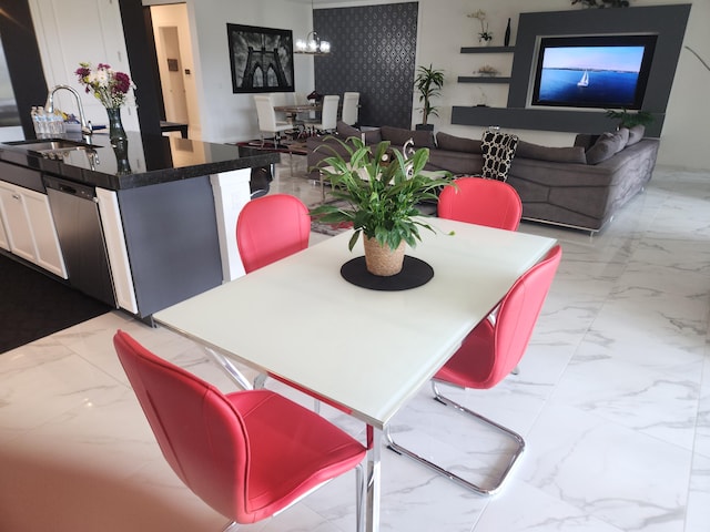 dining area featuring marble finish floor