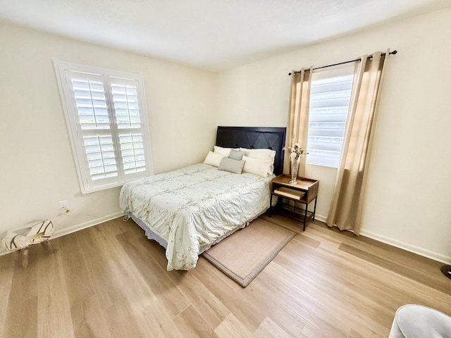 bedroom featuring light hardwood / wood-style flooring