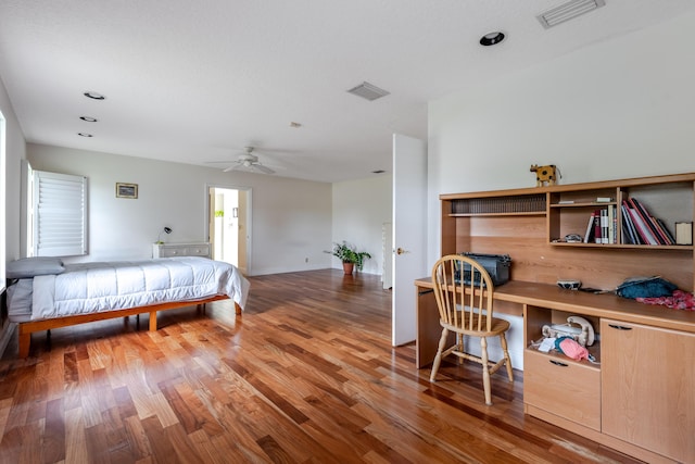 bedroom featuring ceiling fan and wood-type flooring