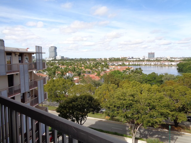 balcony featuring a water view