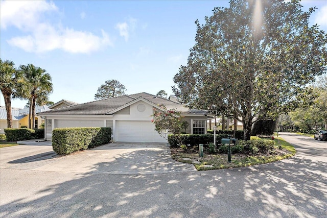 view of front of property with a garage