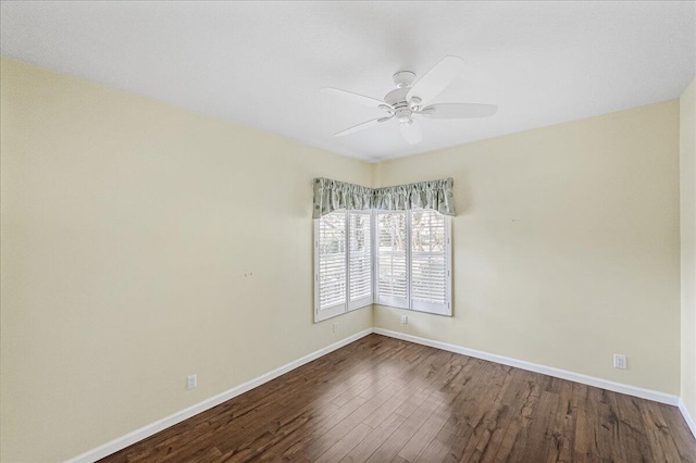 empty room with wood-type flooring and ceiling fan