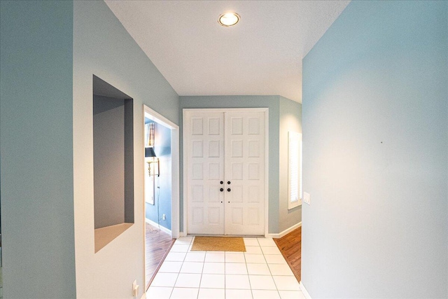 entrance foyer with light tile patterned flooring