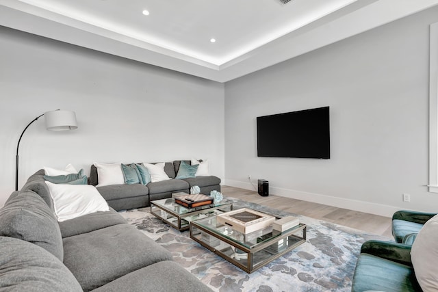 living room with light hardwood / wood-style flooring