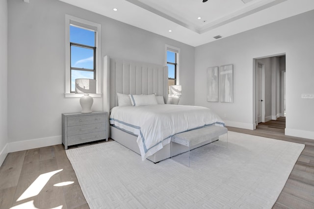 bedroom with light hardwood / wood-style flooring