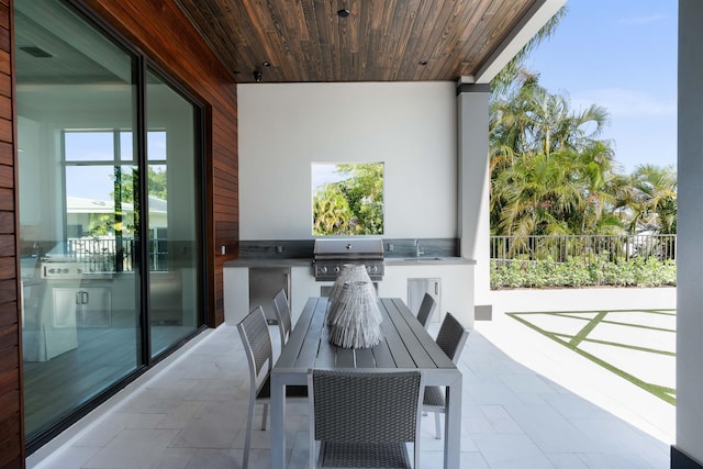 view of patio featuring sink, a grill, and area for grilling