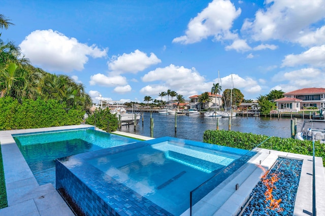 view of pool featuring a water view and a boat dock