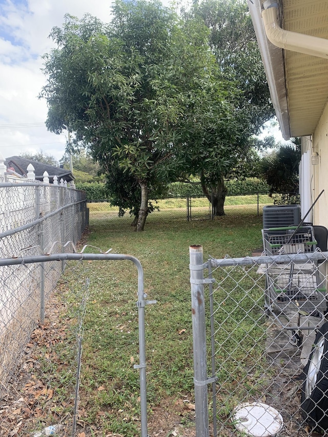 view of yard featuring central AC