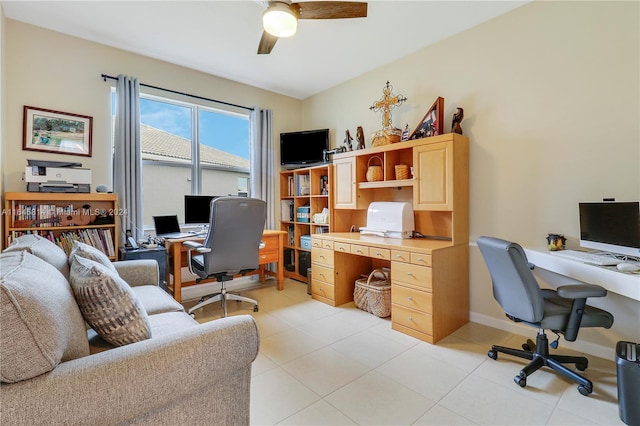 home office featuring ceiling fan and light tile patterned flooring